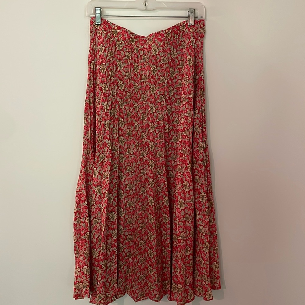 Red pleated midi skirt